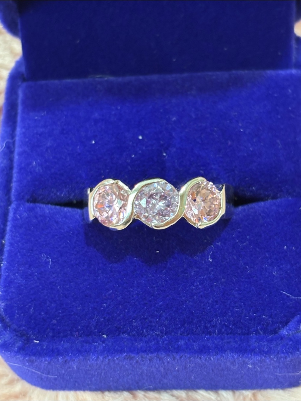 Three-Stone Pink and lavender Cubic Zirconia Ring in Silver